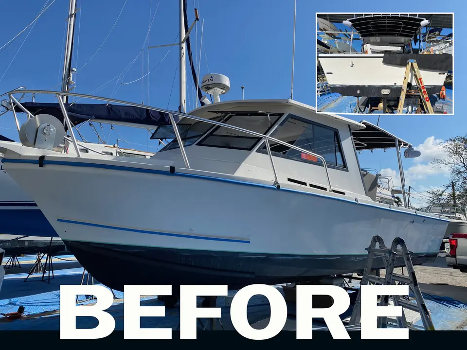 The Big Angler charter boat before its wrap, plain white hull