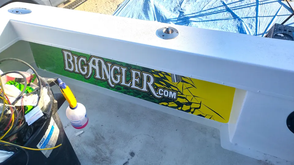 Big Angler logo graphic on the gunwale of the charter boat