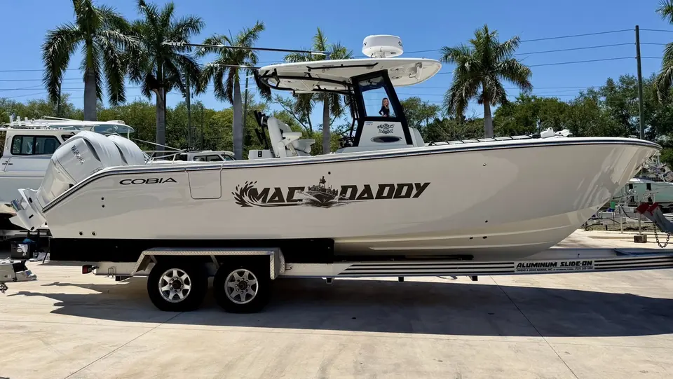 Cobia center console on a trailer with the Mac Daddy name on the hull side