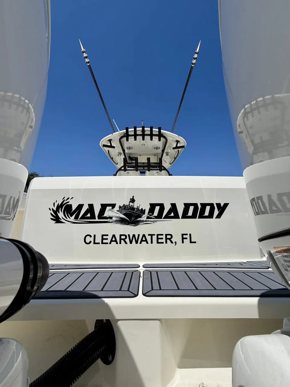 Mac Daddy name with Clearwater, FL hailing port across a center console transom