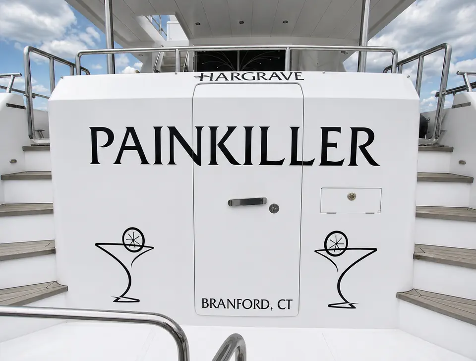 Painkiller, Branford CT black lettering on a white yacht transom