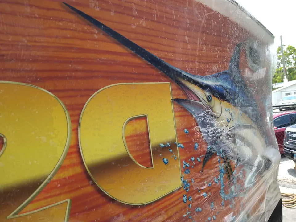 Close-up of the printed marlin on the Yacht Sea transom wrap